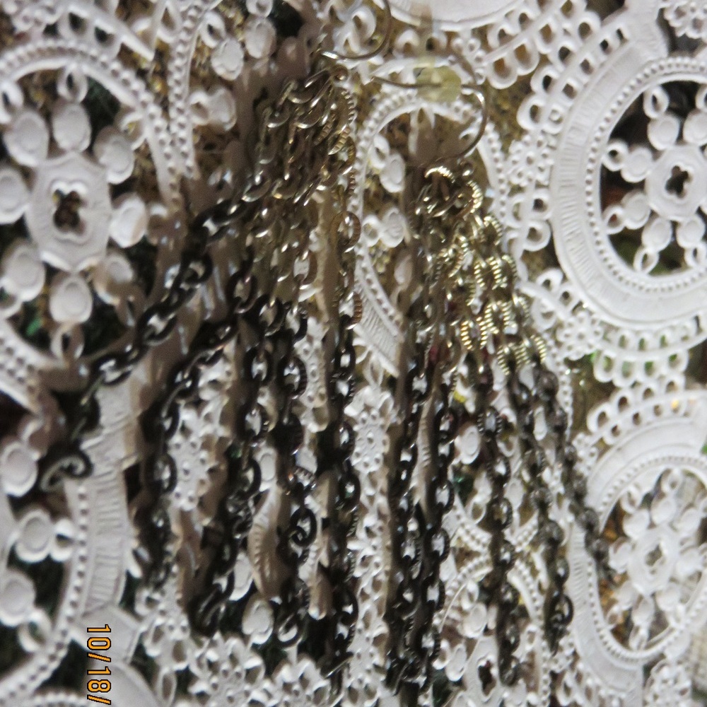 Costume jewelry brown metal dangle pierced earring